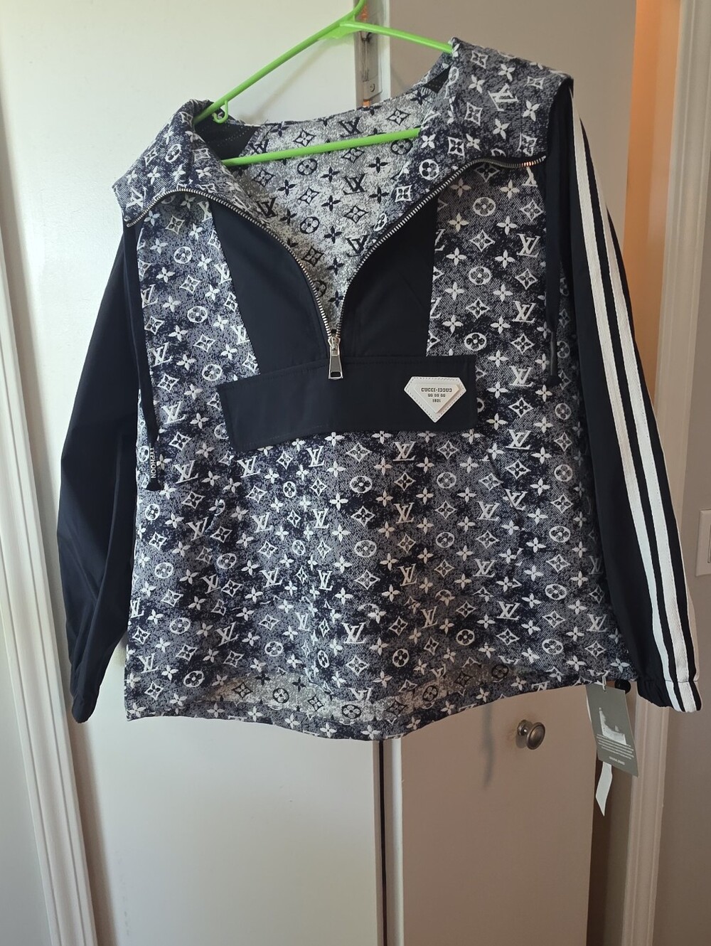 Never Worn - LV Logo Rain Jacket